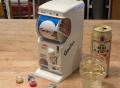 ガチャマシン型貯金箱のカプセルに“..