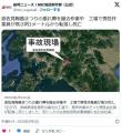 フォークリフトの爪に乗って高さ約3メ..
